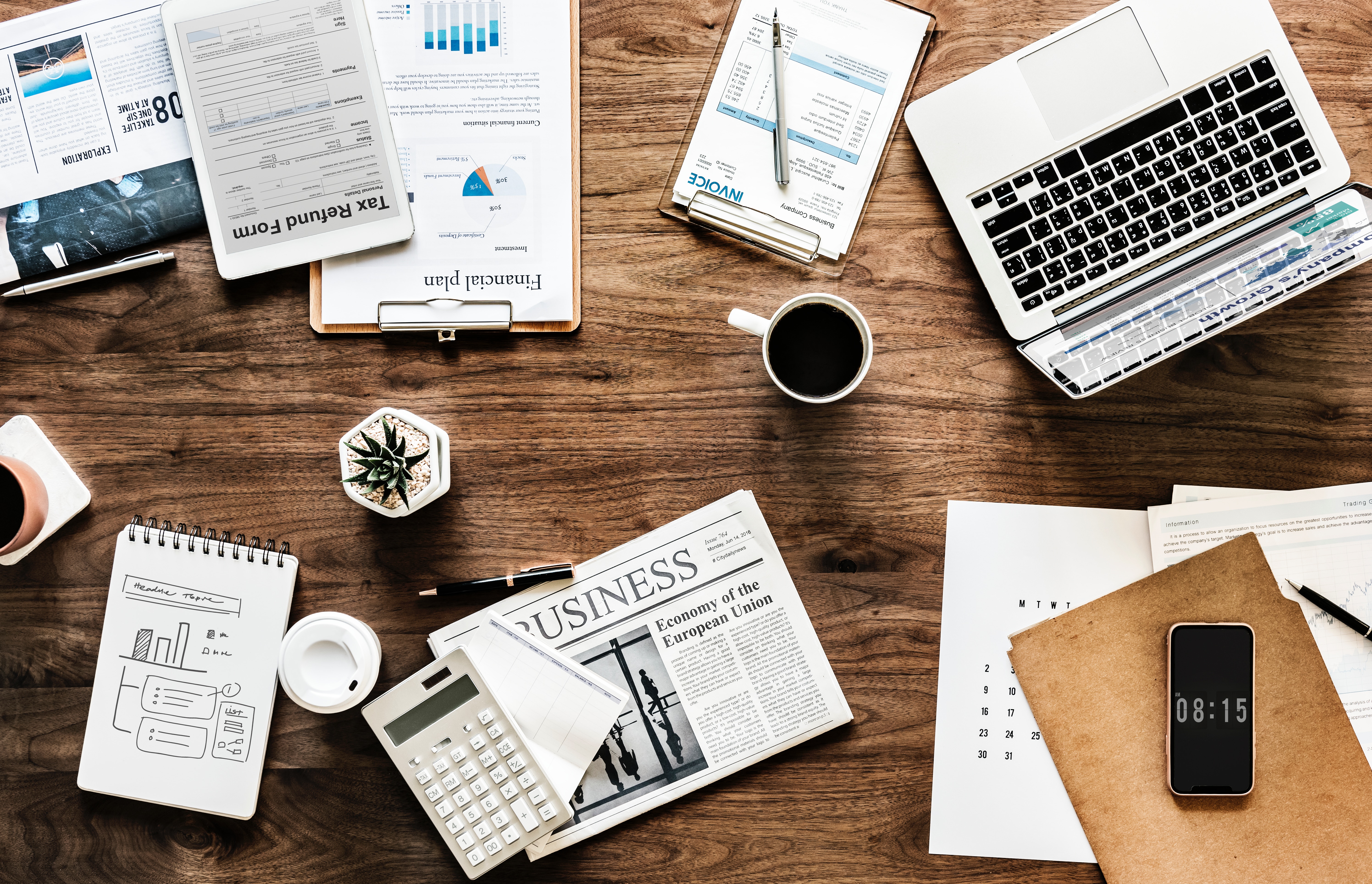 Work supplies scattered across a table.